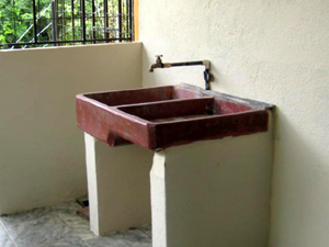 There's roomy laundry area with the traditional Tico double-sided laundry sink.